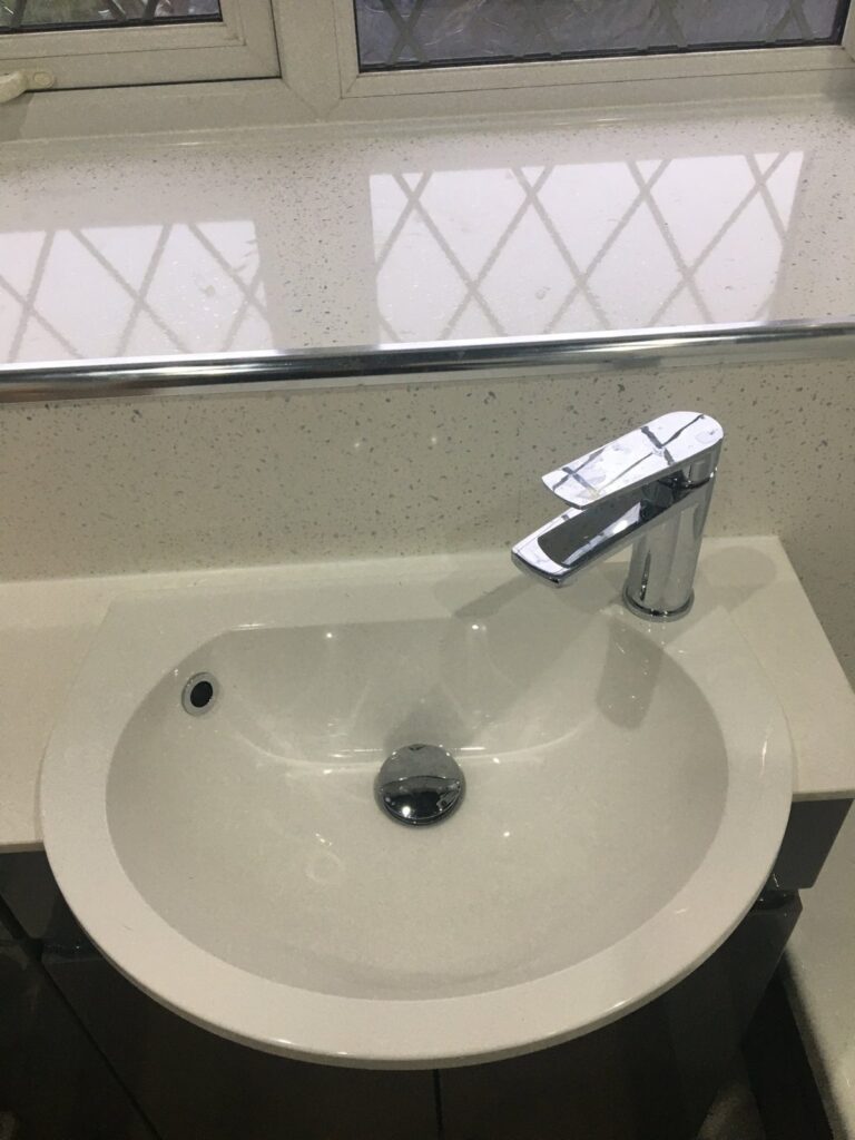 Basin tap replacement carried out by CMG, a plumber in Bolton